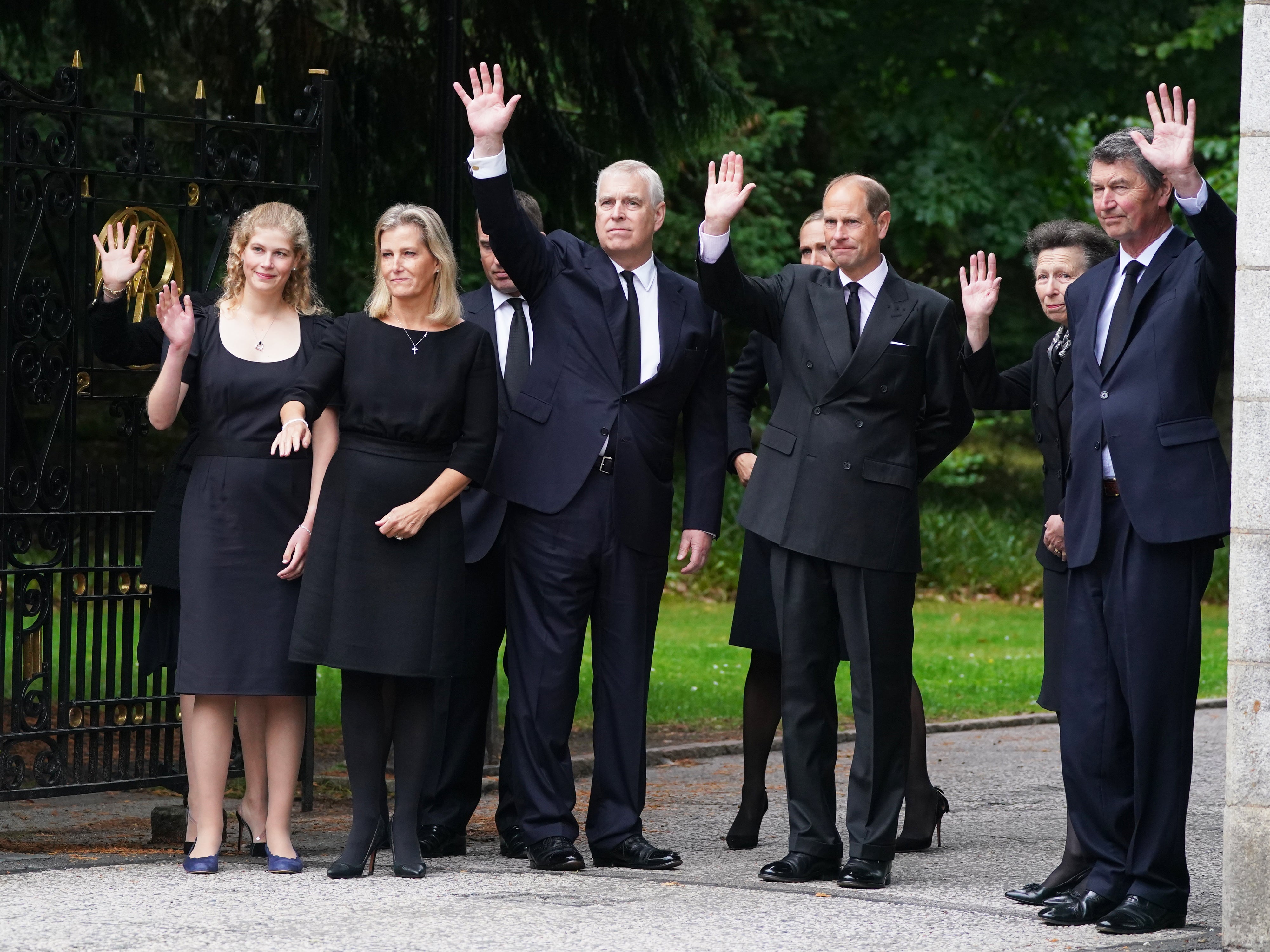 (Left-right) Lady Louise Windsor, the Countess of Wessex, Peter Phillips (hidden), the Duke of York, Zara Tindall (hidden), the Earl of Wessex, the Princess Royal and Vice Admiral Timothy Laurence wave to well-wishers outside Balmoral
