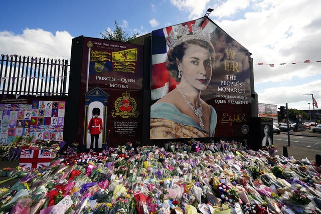 Flowers laid on Belfast’s Shankill Road following the death of Queen Elizabeth II on Thursday (Brian Lawless/PA)