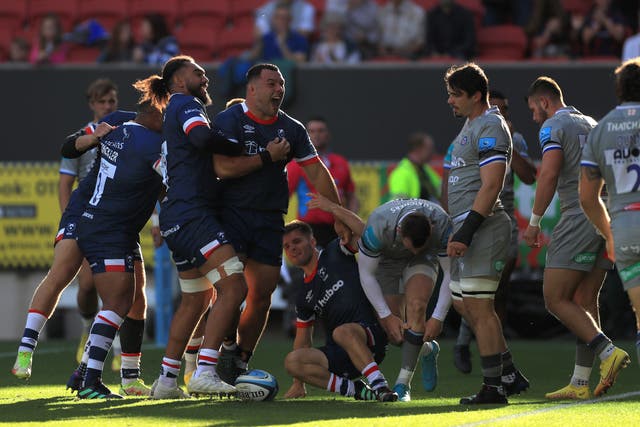 Ellis Genge, centre left, celebrates his early opening try (Bradley Collyer/PA)
