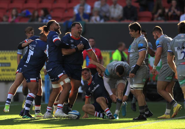 Ellis Genge, centre left, celebrates his early opening try (Bradley Collyer/PA)