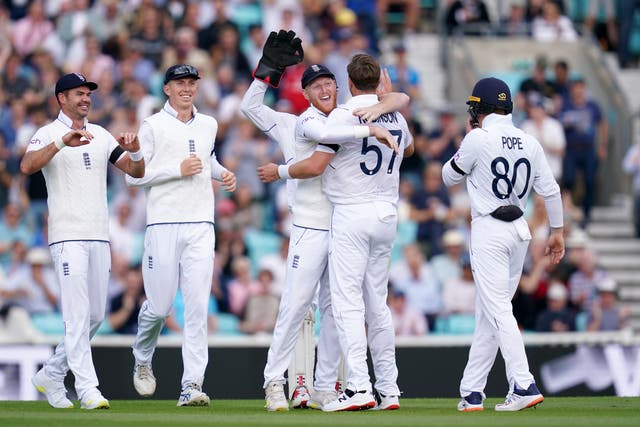 England’s Ollie Robinson is embraced by captain Ben Stokes after taking the wicket of South Africa’s Keegan Petersen on day three of the third LV= Insurance Test match at the Kia Oval, London. Picture date: Saturday September 10, 2022.