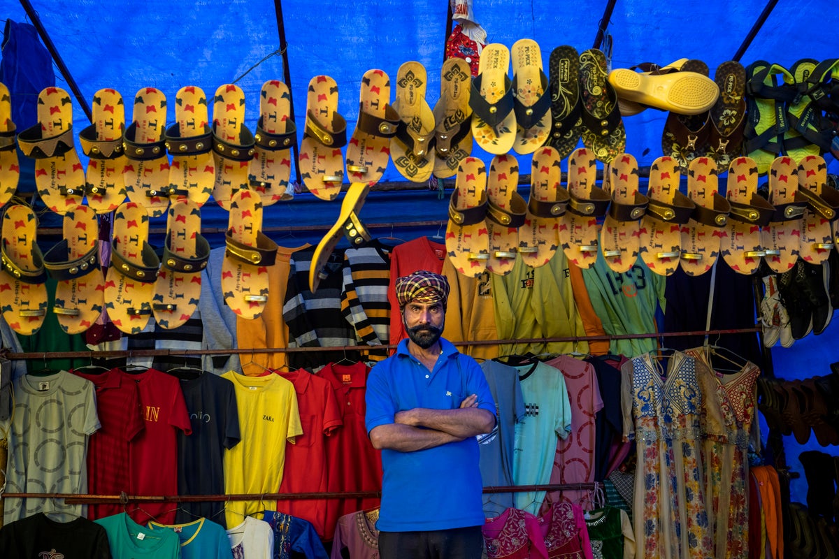 AP PHOTOS: At roving fairs, sellers keep bartering tradition