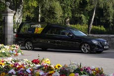 Thousands line streets as Queen’s coffin embarks on trip to final resting place