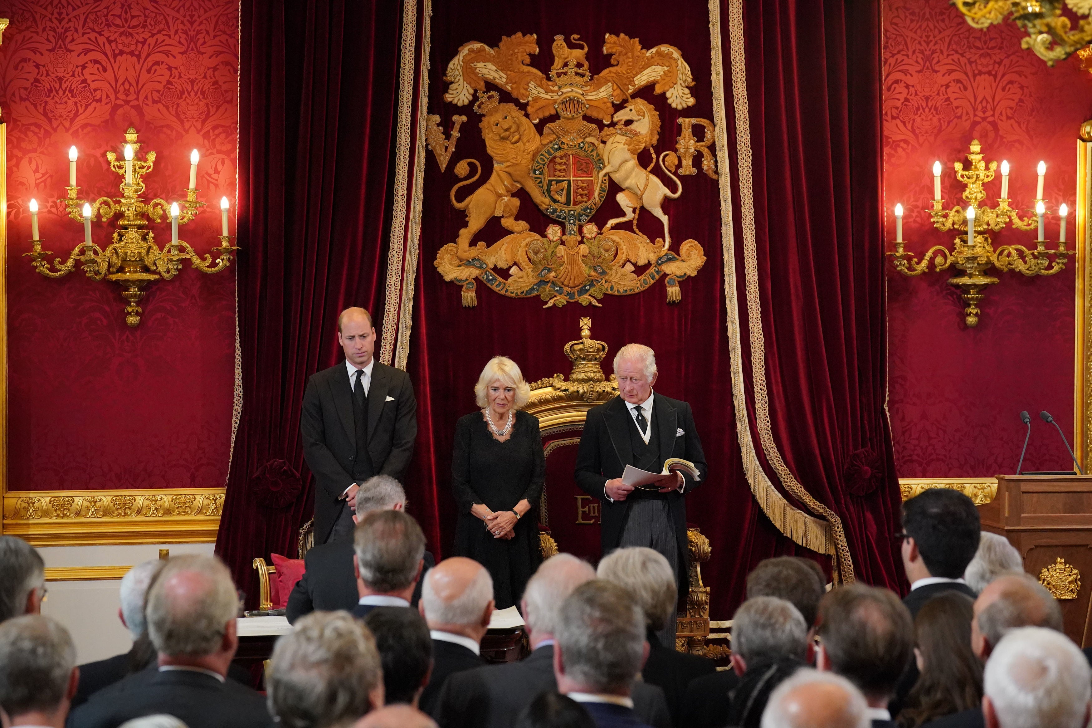 Prince William, left, and the Queen Consort attend the privy council meeting on Saturday after the proclamation of Charles III as King