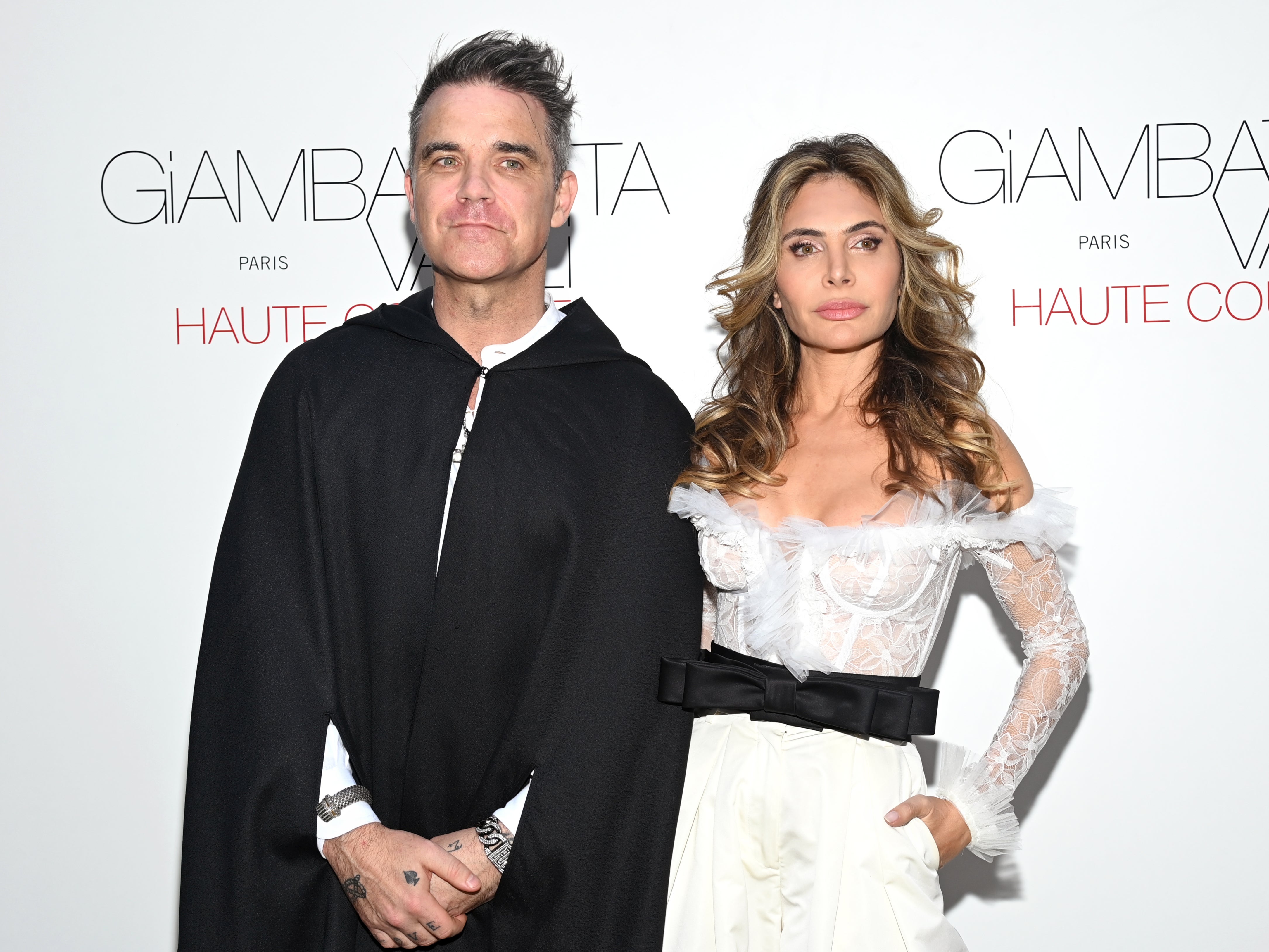 Robbie Williams and Ayda Field Williams attend the Giambattista Valli Haute Couture Fall Winter 2022