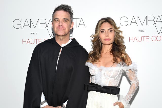 <p>Robbie Williams and Ayda Field Williams attend the Giambattista Valli Haute Couture Fall Winter 2022</p>