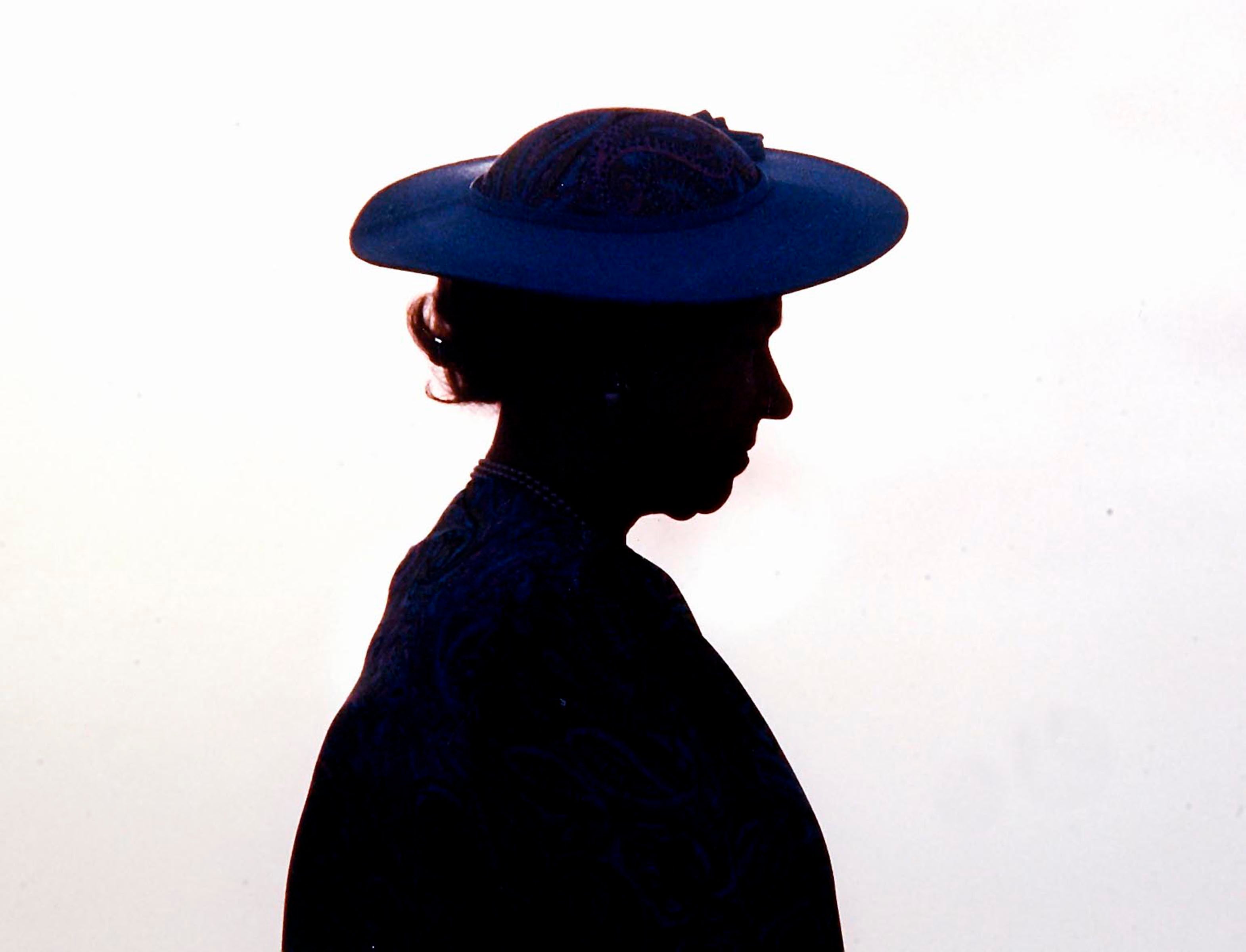 Britain’s Queen Elizabeth II silhouetted during welcoming ceremonies in Barbados in 1989