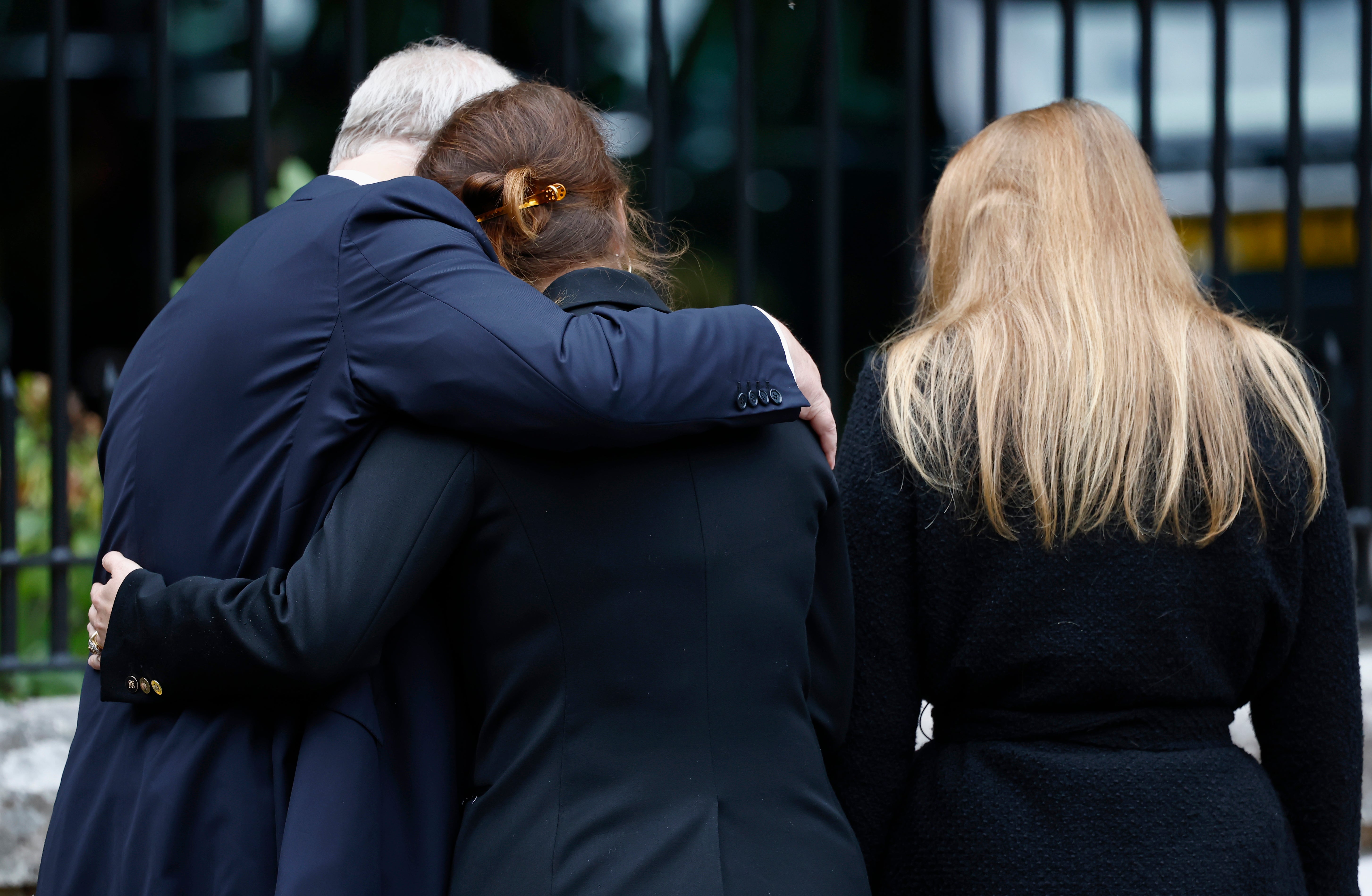 Prince Andrew consoles his daughter following the death of his mother