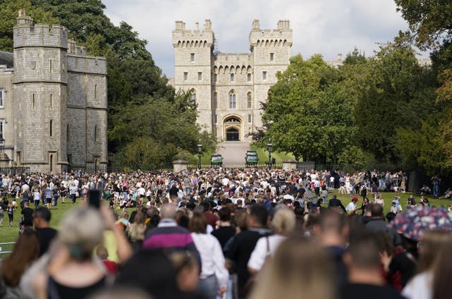 People make their way along the Long Walk towards Cambridge Gate outside Windsor Castle (Andrew Matthews/PA)