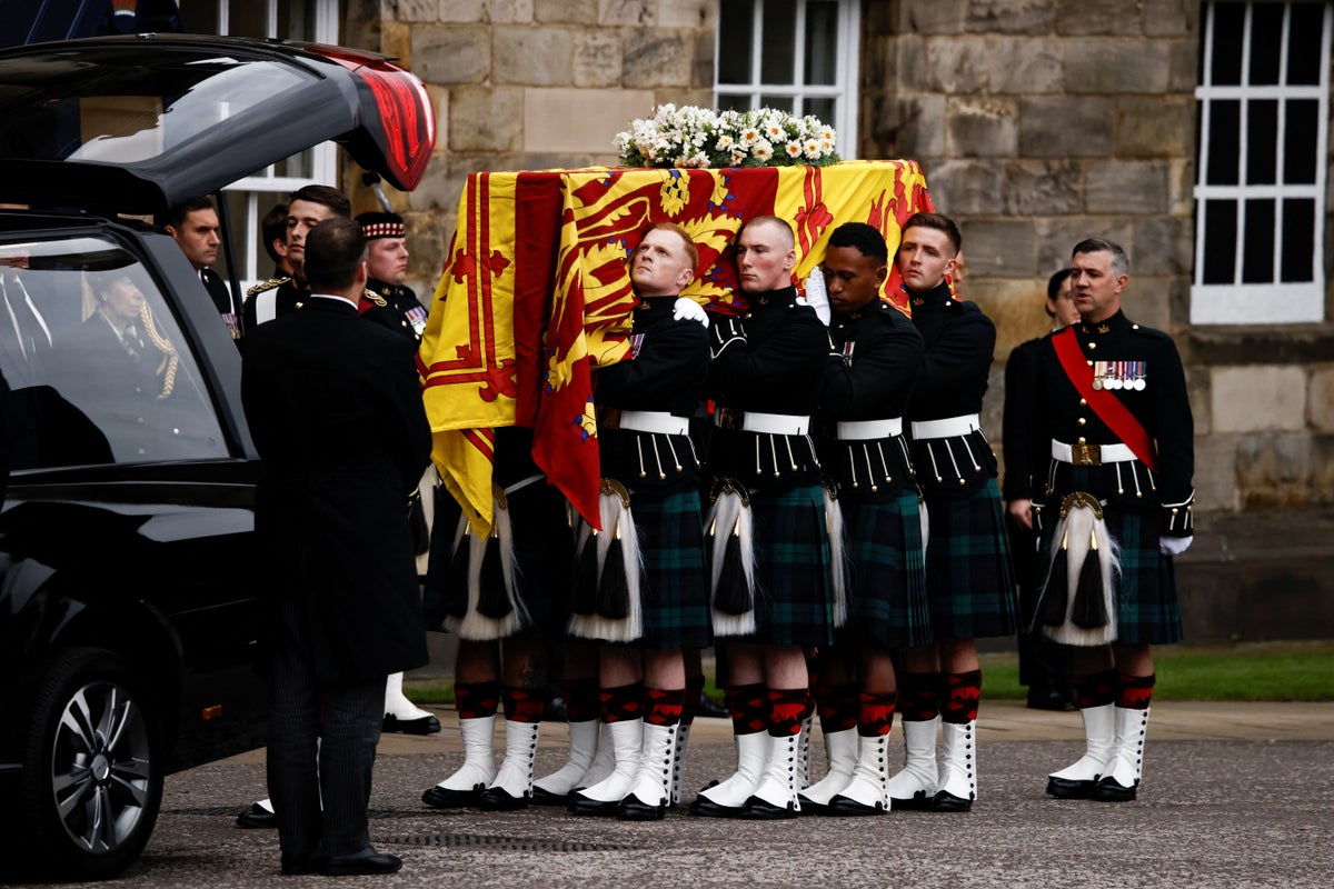 Queen’s coffin arrives at Palace of Holyroodhouse in Edinburgh after long journey