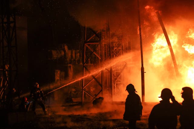 <p>Firefighters work at the site of a power plant damaged by a Russian missile strike in Kharkiv, Ukraine on Sunday </p>