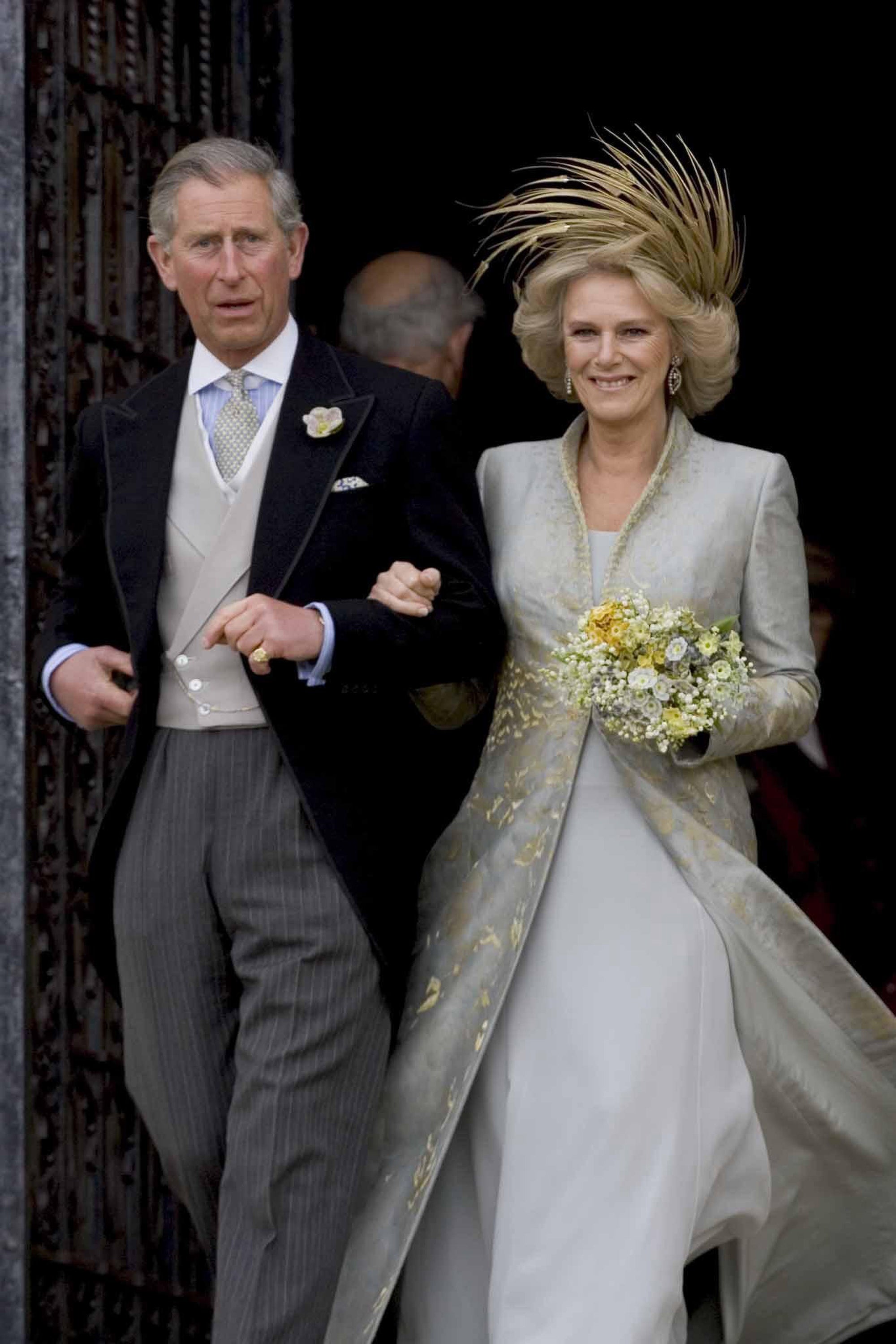 The Prince of Wales and his bride Camilla, Duchess of Cornwall leave St George’s Chapel in Windsor, following their wedding (Bob Collier/PA)