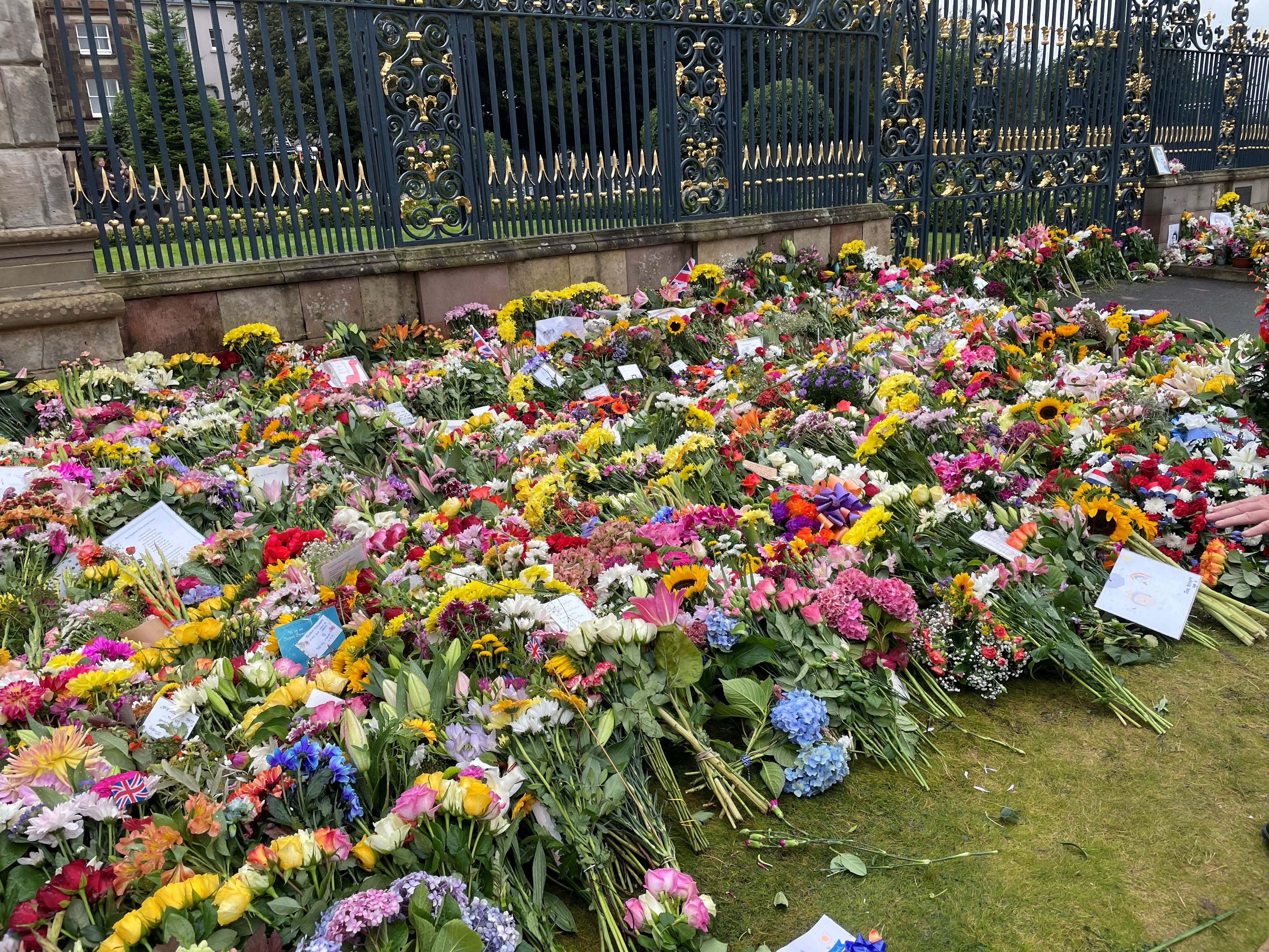 Floral tributes at Hillsborough Castle following the death of the Queen (Jonathan McCambridge/PA)