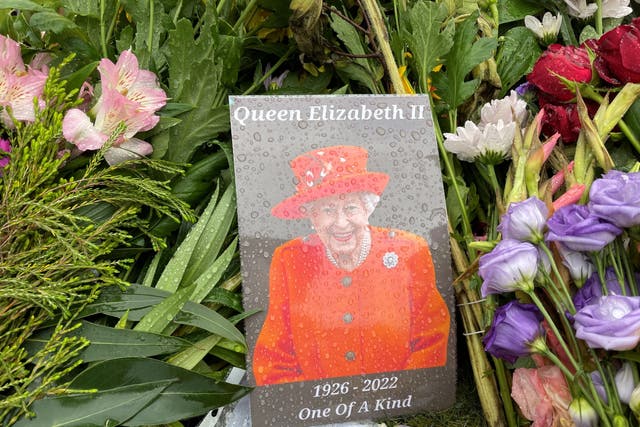 Floral tributes at Hillsborough Castle, Co Down (Jonathan McCambridge/PA)