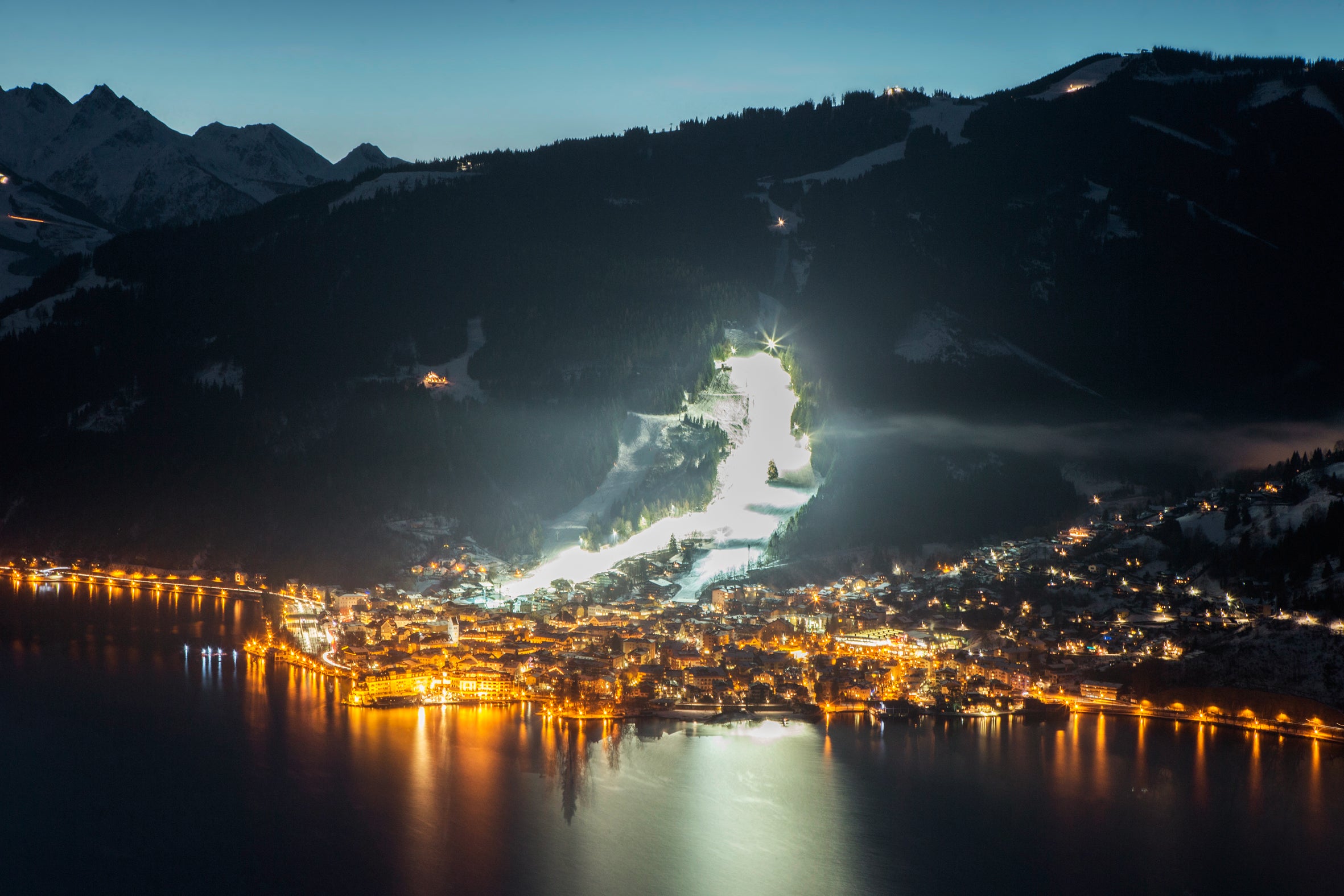 Take to floodlit slopes under starry skies