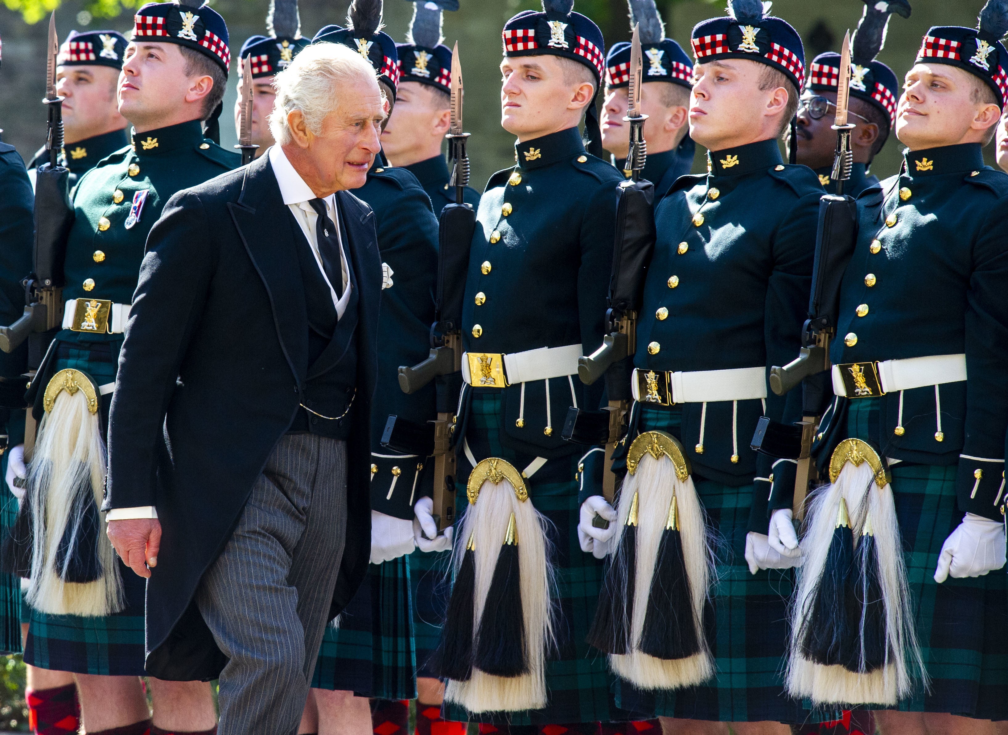 King Charles III inspects the guard of honour at the Ceremony of the Keys at the Palace of Holyroodhouse (Lisa Ferguson/The Scotsman/PA)