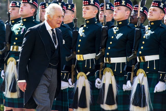 King Charles III inspects the guard of honour at the Ceremony of the Keys at the Palace of Holyroodhouse (Lisa Ferguson/The Scotsman/PA)