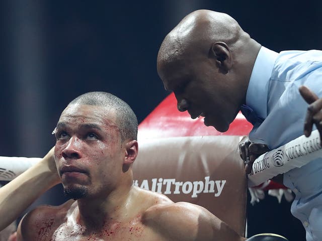 <p>Chris Eubank (right) with son Chris Jr during the latter’s 2018 fight with George Groves</p>