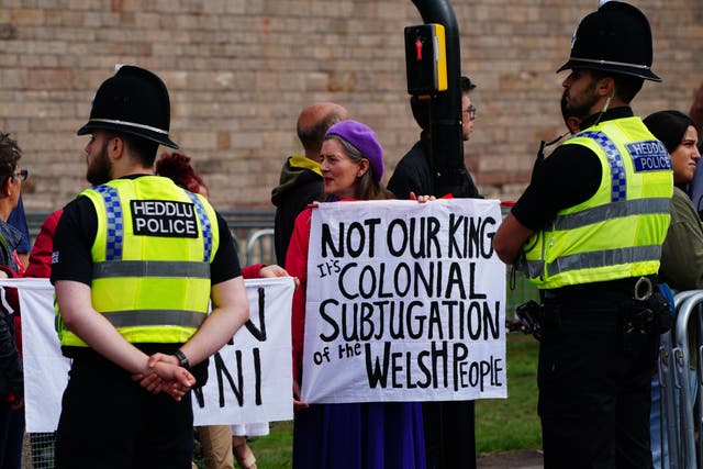 People protest ahead of the Accession Proclamation Ceremony at Cardiff Castle, Wales, publicly proclaiming King Charles III as the new monarch. Picture date: Sunday September 11, 2022. (Ben Birchall/PA)