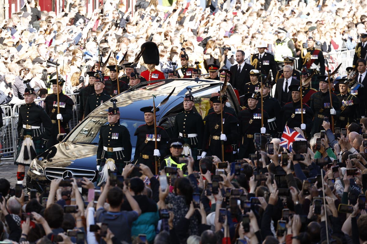 ‘A very special moment in time’: Hundreds of thousands pack Edinburgh streets for Queen’s coffin procession