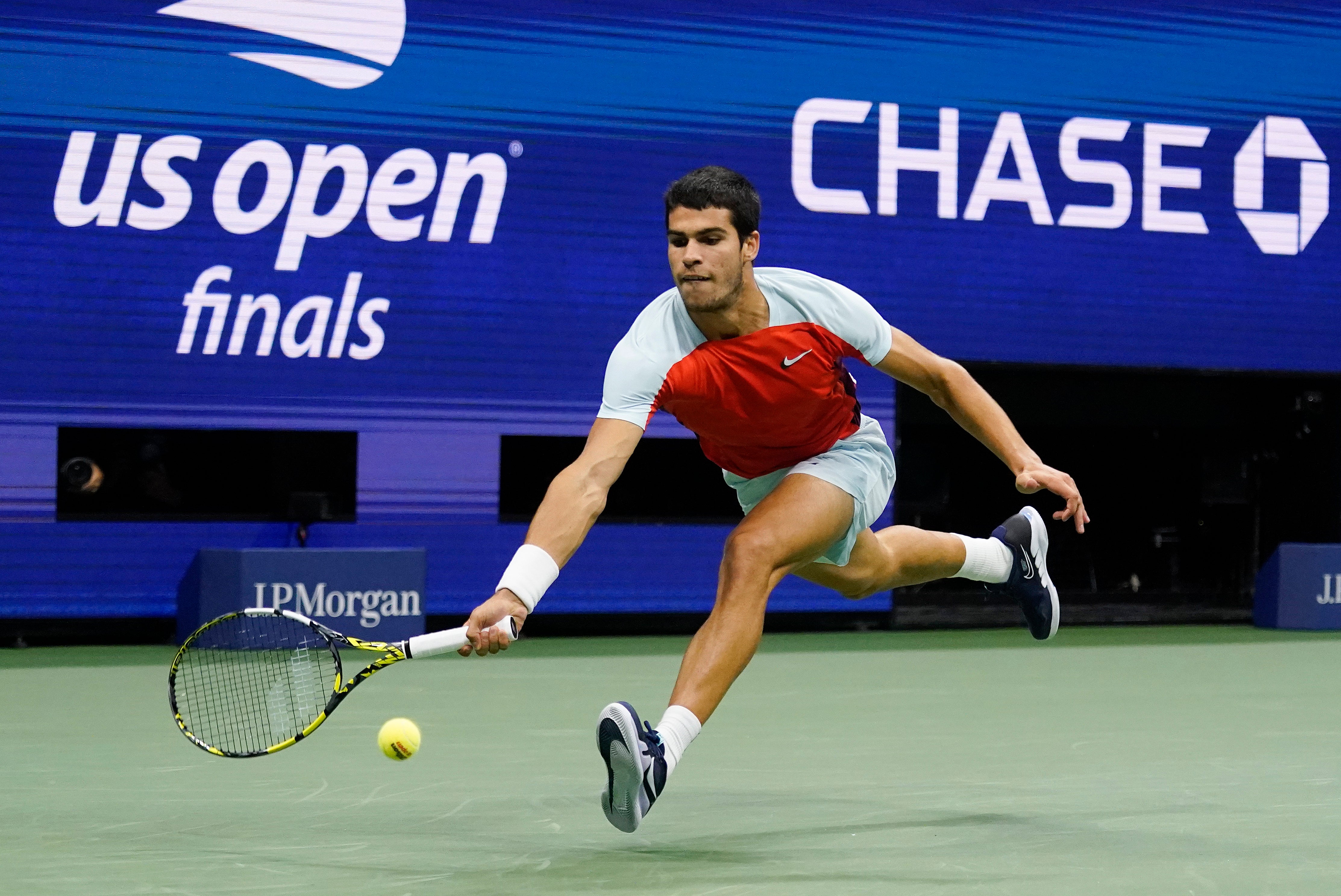 Carlos Alcaraz chases down a forehand (Charles Krupa/AP)