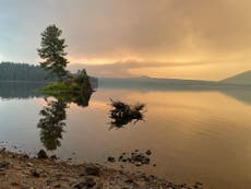 Oregon wildfire breaks free and spreads to massive size as Portland is covered in smoke