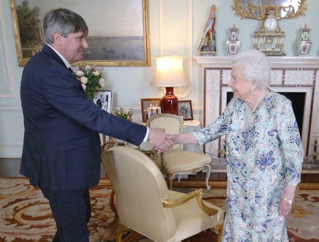 Queen Elizabeth II receives Simon Armitage (Jonathan Brady/PA)