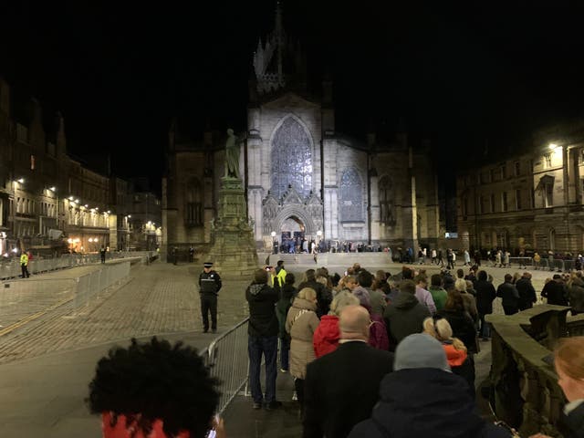 Mourners in Edinburgh have shown up in their ‘tens of thousands’ to pay their respects to the Queen with many queueing overnight (Gavin Hamilton/PA)