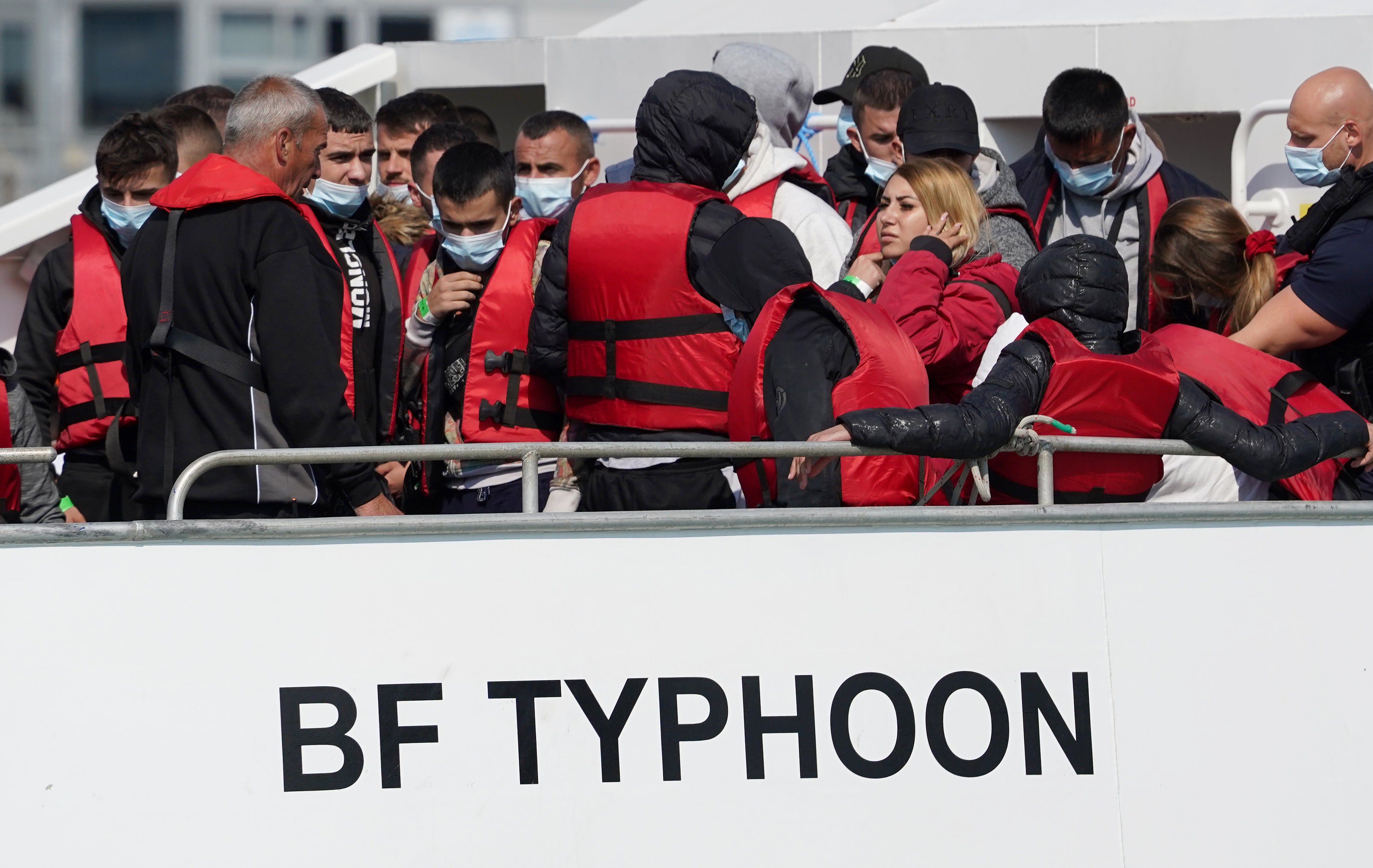 A group of people thought to be migrants are brought into Dover, Kent (Gareth Fuller/PA)