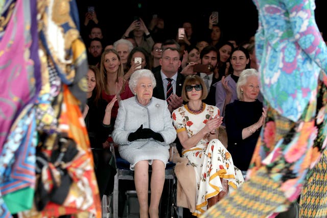 Queen Elizabeth II sat front row at London Fashion Week in 2018 (Yui Mok/PA)