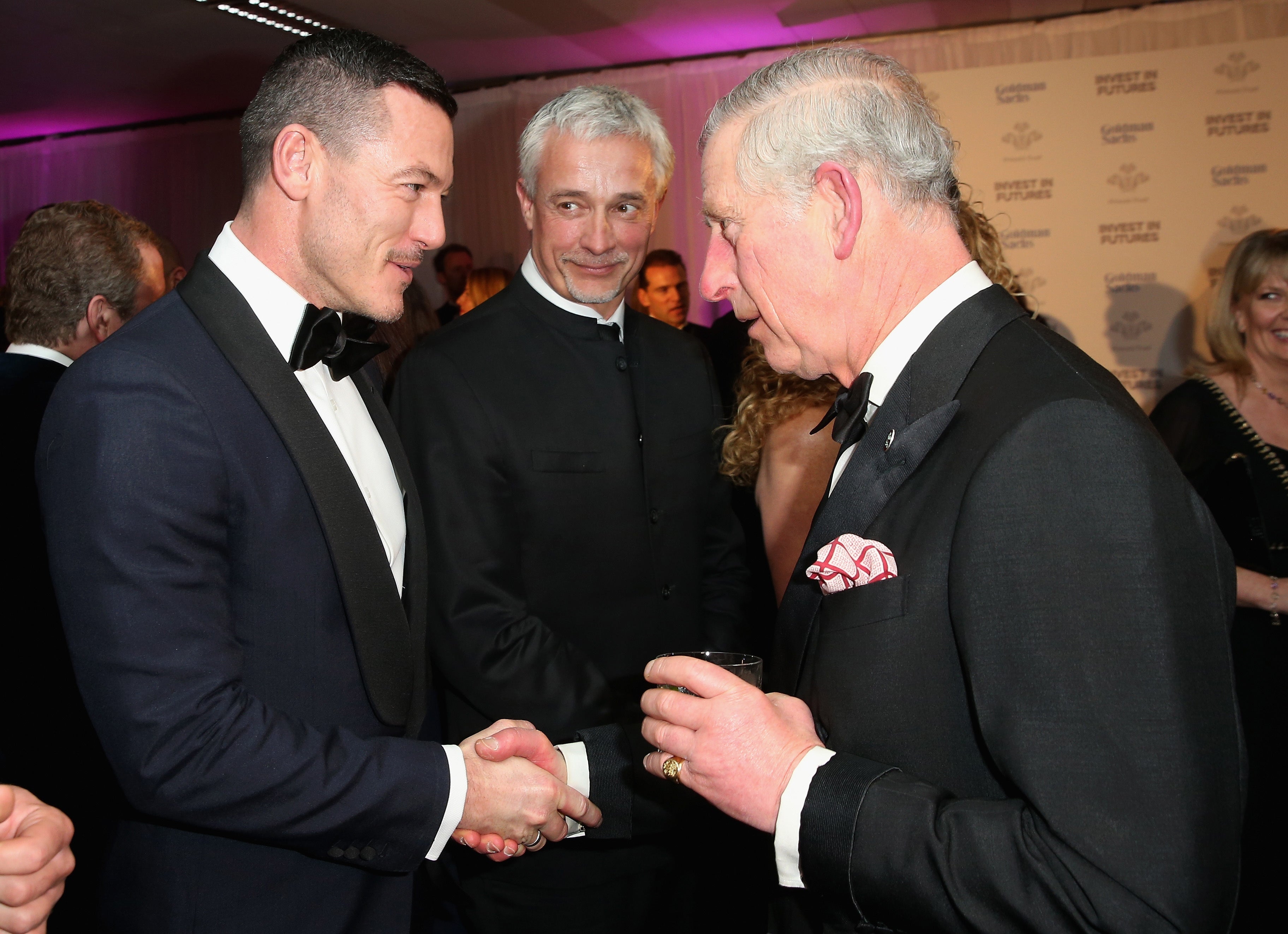 Luke Evans talks to the Prince of Wales – now King Charles III – as they attend a pre-dinner reception for the Prince’s Trust Invest in Futures Gala Dinner at The Old Billingsgate in London in 2016 (Chris Jackson/PA)