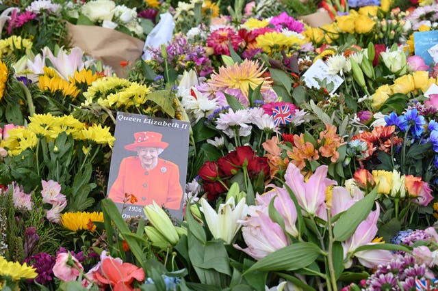 Floral tributes to Queen Elizabeth II outside Hillsborough Castle (Michael Cooper/PA)