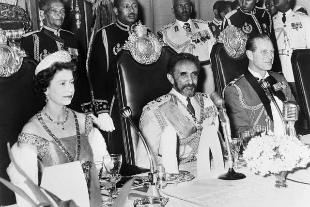 <p>A person’s legacy means different things to different people: Queen Elizabeth II and Prince Philip attend a state dinner with the emperor of Ethiopia Haile Selassie in Addis Ababa during a state visit in Ethiopia on 5 February 1965 </p>