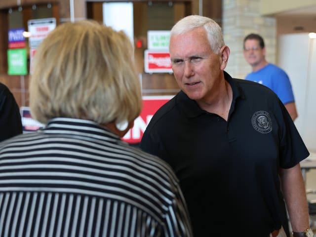 <p>Former Vice President Mike Pence greets guests at the Bremer County Republicans' Grill and Chill lunch on August 20, 2022 in Waverly, Iowa</p>