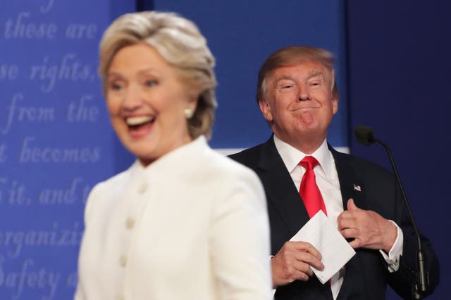 <p>Hillary Clinton and Donald Trump on stage during a presidential debate in 2016 </p>