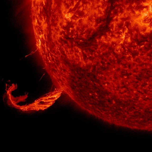 <p>A coronal mass ejection from the Sun can fling radiation, charged solar particles, toward the Earth. </p>