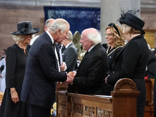 King Charles III and the Queen Consort greet President Michael D Higgins (PA)