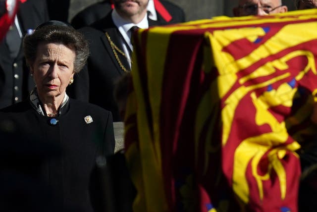 The Princess Royal watches as the coffin of the Queen is taken to a hearse as it departs St Giles’ Cathedral (Jacob King/PA)