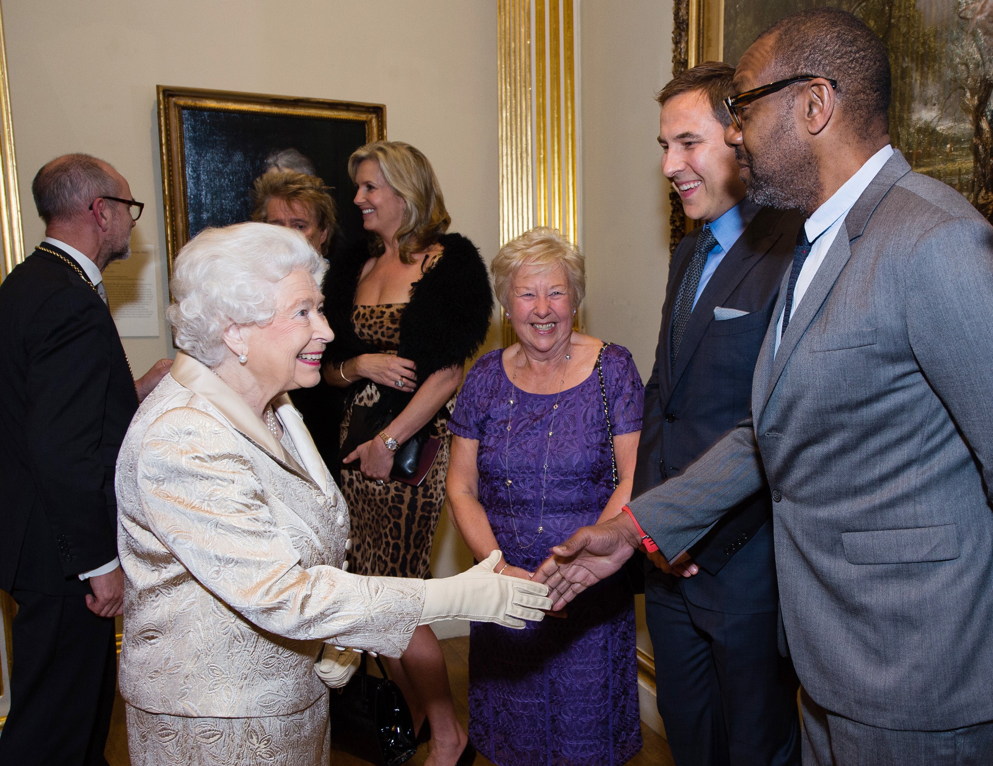 Queen Elizabeth II greets Lenny Henry at London’s Royal Academy of Arts on 11 October 2016