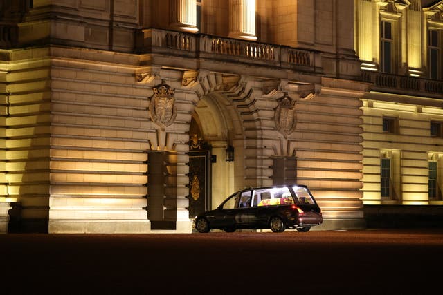The hearse carrying the coffin of Queen Elizabeth II arrives at Buckingham Palace, London (Corporal Rebecca Brown/UK/PA)