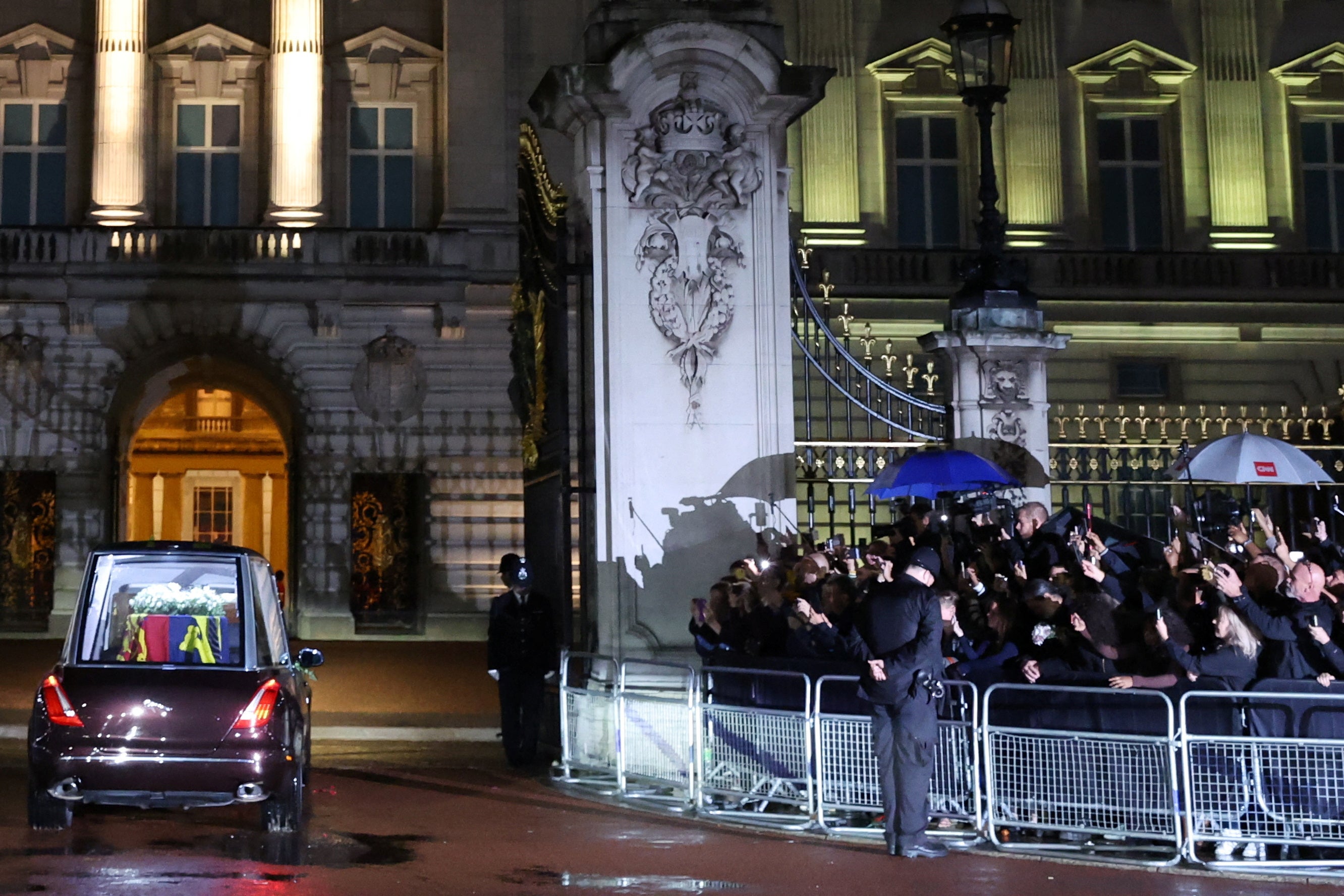 The hearse carrying the coffin of Queen Elizabeth II arrives at Buckingham Palace, London, where it will lie at rest overnight in the Bow Room (Paul Childs/PA)