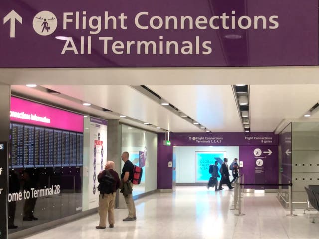 <p>Flight changes: Passengers at London Heathrow airport</p>