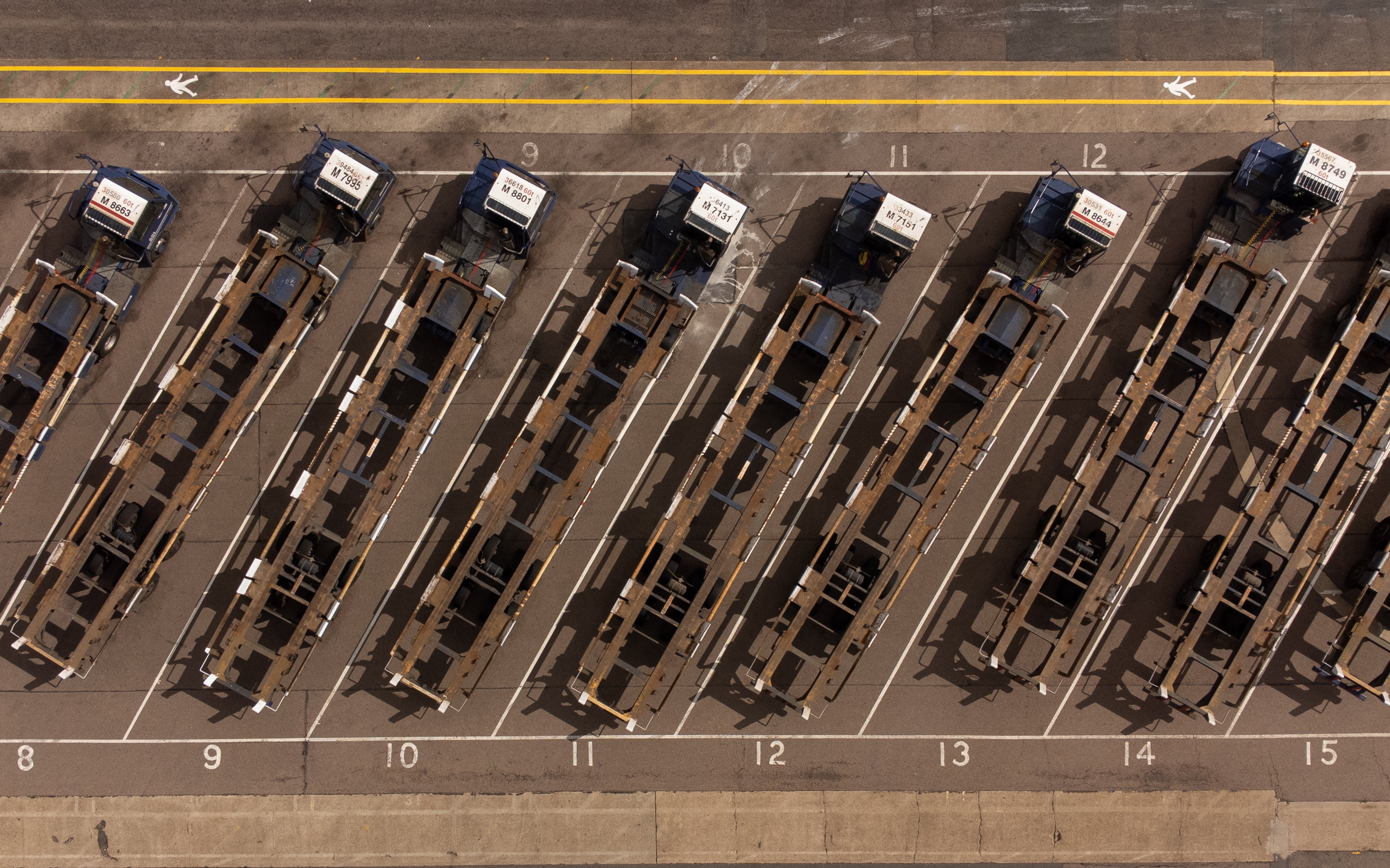 Shipping container transporters sit in the Port of Felixstowe in Suffolk, following a strike by members of the Unite union last month (Joe Giddens/PA)