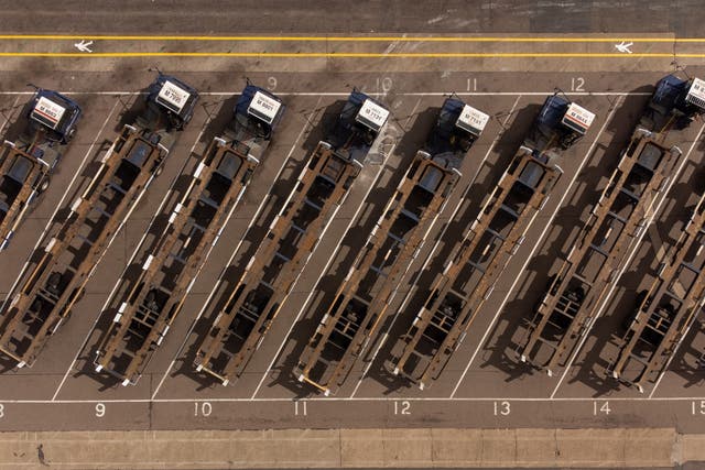 Shipping container transporters sit in the Port of Felixstowe in Suffolk, following a strike by members of the Unite union last month (Joe Giddens/PA)