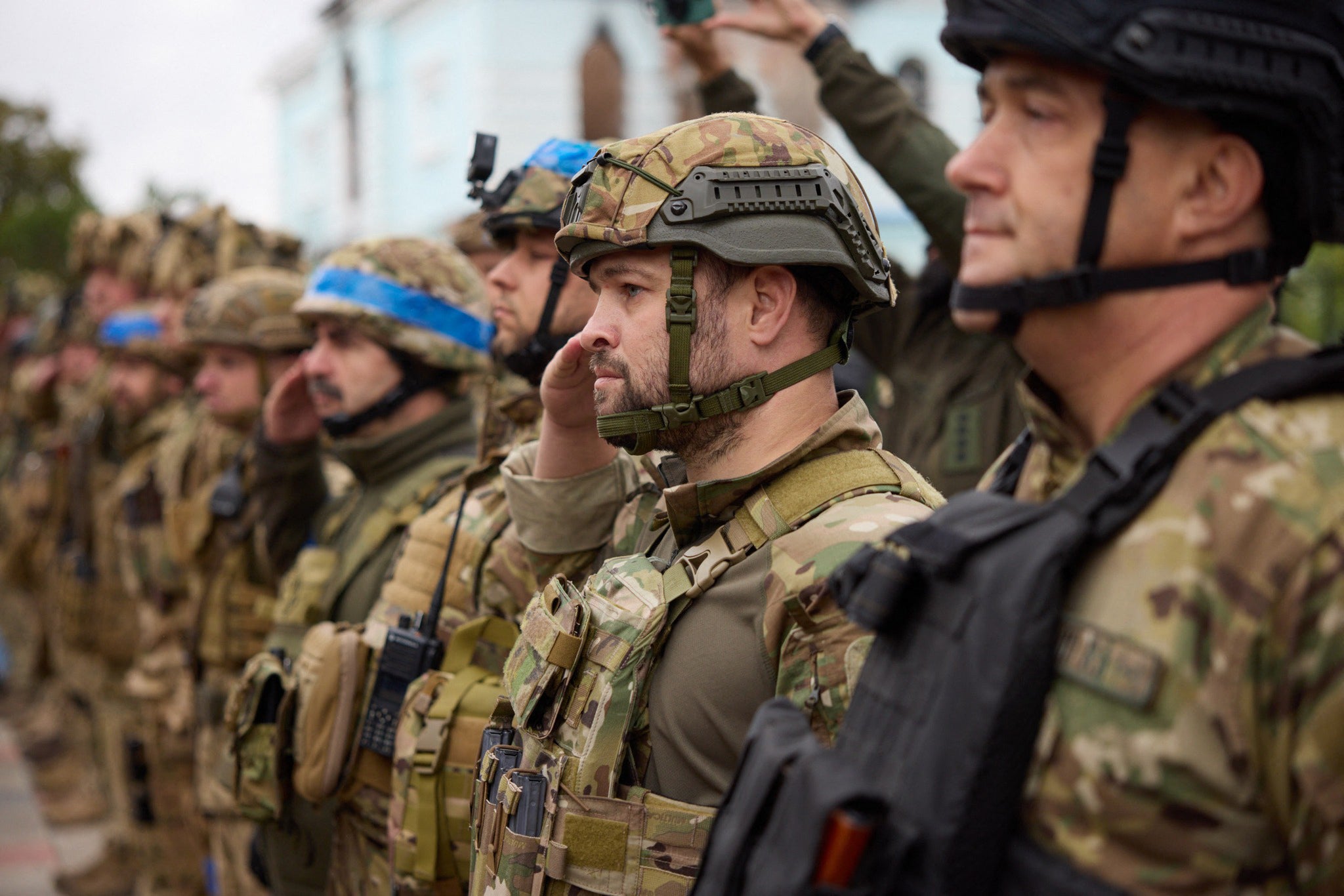 Ukrainian troops take part in the flag raising ceremony.