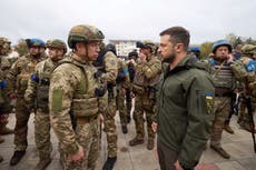 Ukraine war - live: Zelensky praises troops on visit to newly liberated city