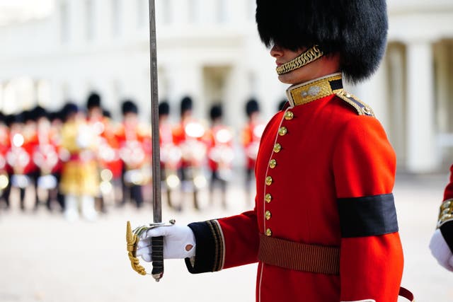 Members of the Coldstream Guards leave Wellington Barracks, central London, ahead of the ceremonial procession of the coffin of the Queen (Ben Birchall/PA)