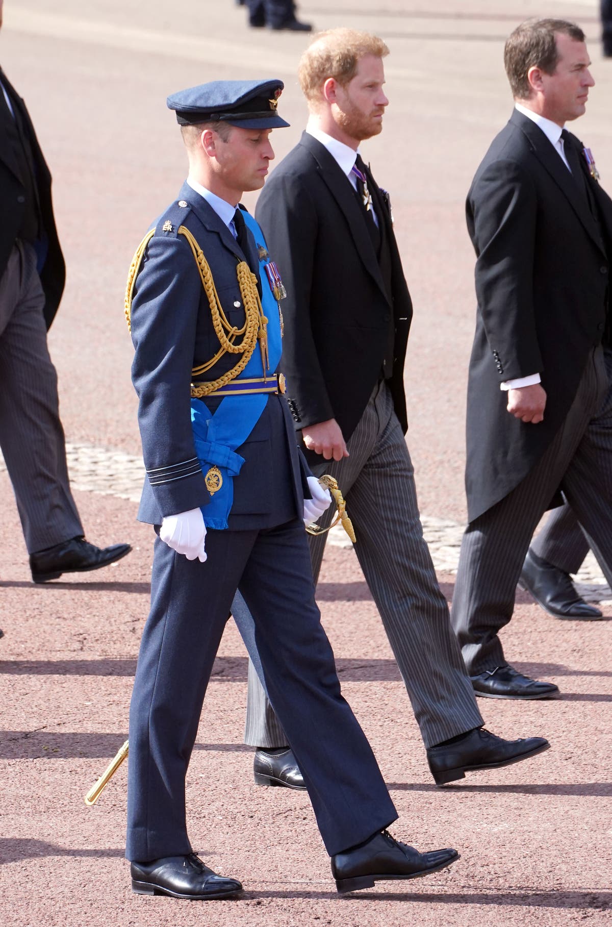 William and Harry side by side as Queen’s loyal staff join procession