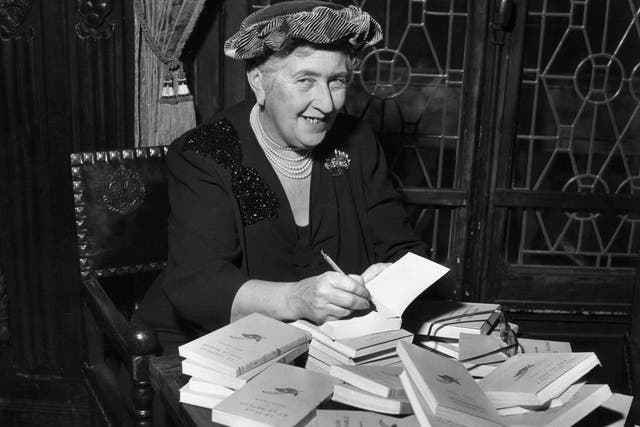 <p>British mystery author Agatha Christie autographing French editions of her books, circa 1950</p>