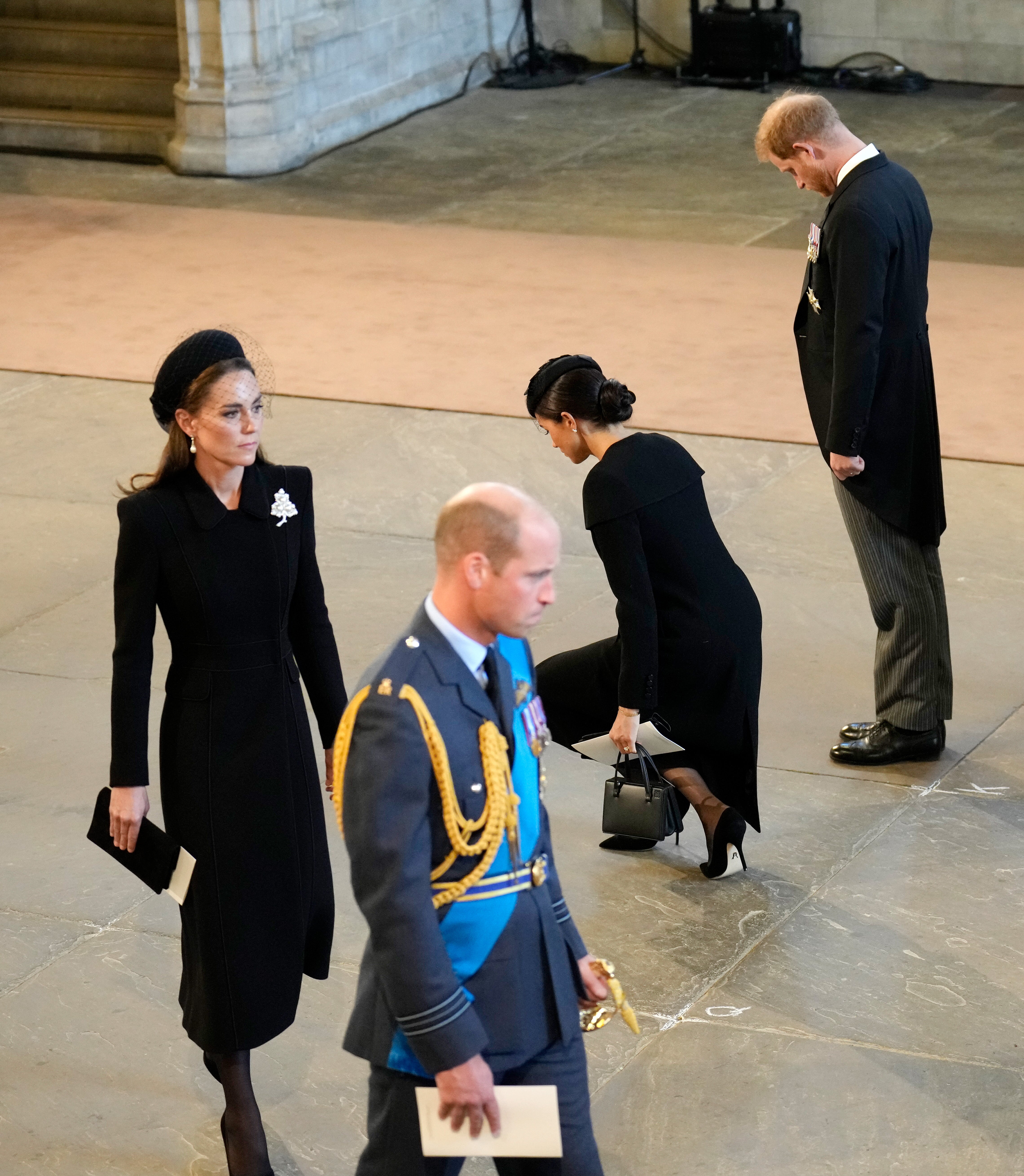Meghan Markle curtsies in front of Queen’s coffin at Westminster Hall